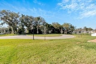 surrounding community featuring a lawn