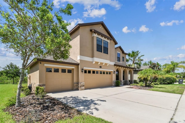 view of front of property with a garage