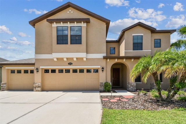 view of front of property with a garage