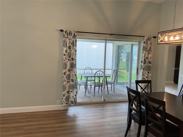 dining space featuring hardwood / wood-style floors