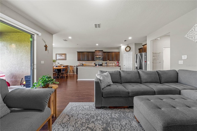 living room featuring wood-type flooring