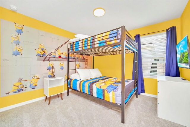 bedroom featuring light colored carpet