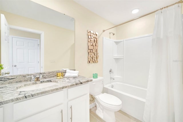 full bathroom with vanity, shower / bath combo, and toilet