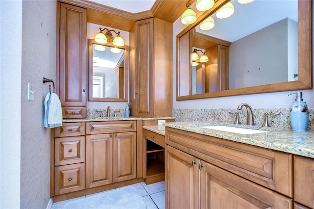 bathroom with vanity and tile patterned floors