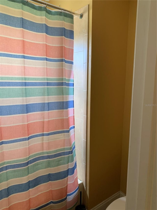 full bathroom with toilet
