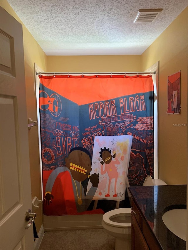 bathroom with vanity, a textured ceiling, toilet, and a shower with shower curtain