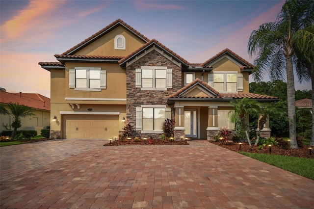 mediterranean / spanish-style home featuring a garage