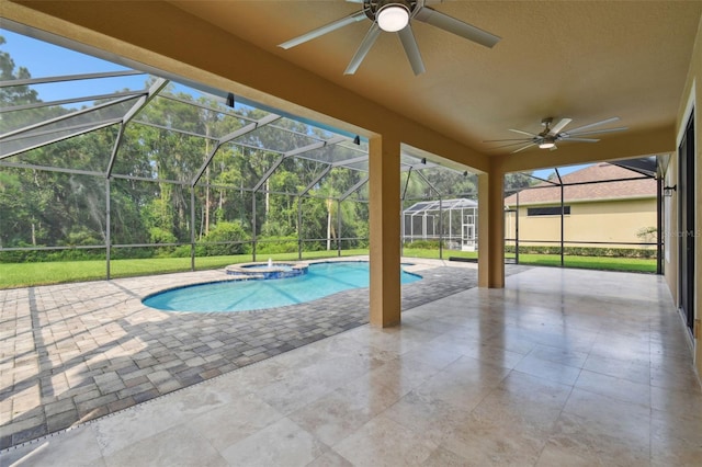 view of pool featuring ceiling fan, an in ground hot tub, a patio, and glass enclosure