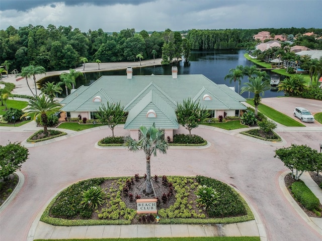 birds eye view of property featuring a water view