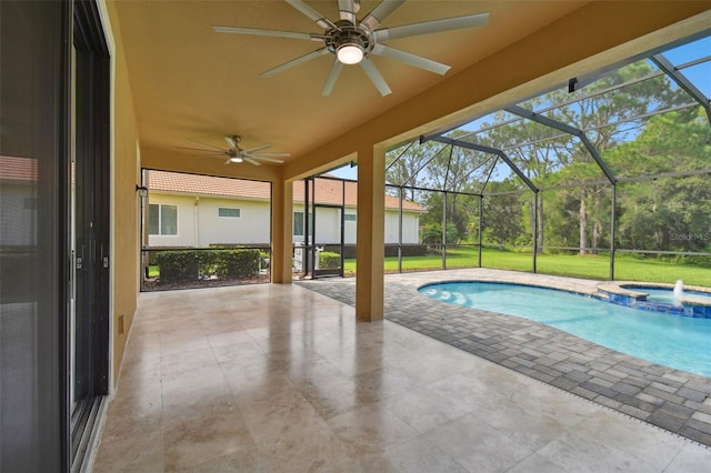 view of swimming pool featuring a lawn, glass enclosure, ceiling fan, a patio area, and an in ground hot tub