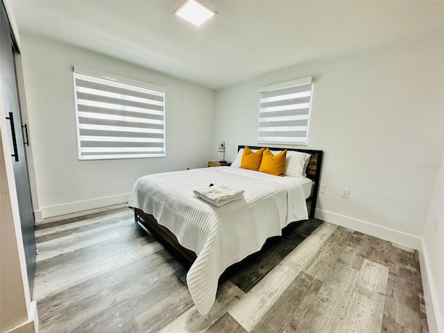 bedroom featuring light hardwood / wood-style flooring