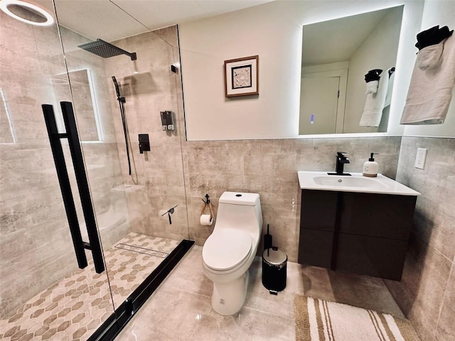 bathroom featuring tile walls, tile patterned flooring, walk in shower, toilet, and vanity