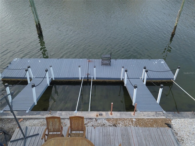 view of dock with a water view