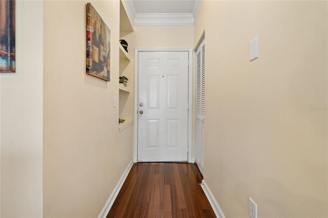 hallway featuring hardwood / wood-style flooring and ornamental molding