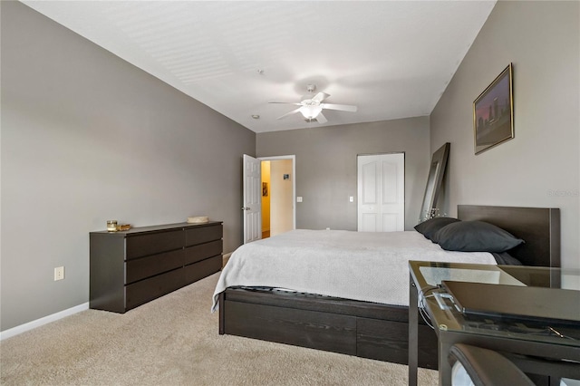 bedroom featuring carpet floors, a closet, and ceiling fan