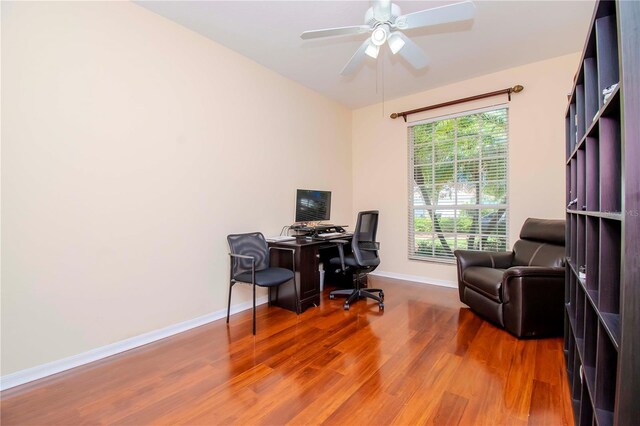 office area featuring hardwood / wood-style floors and ceiling fan