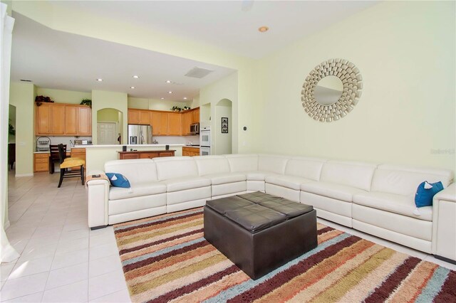 living room featuring light tile patterned flooring