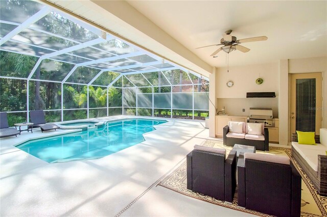 view of swimming pool featuring ceiling fan, a patio, grilling area, glass enclosure, and an outdoor living space