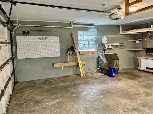 garage featuring a workshop area and a garage door opener