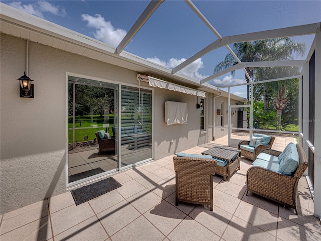 view of patio featuring a lanai and an outdoor hangout area