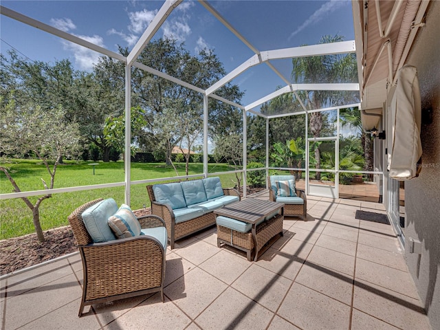 view of patio with outdoor lounge area and glass enclosure