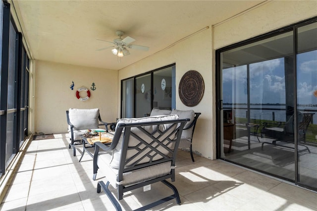 exterior space with ceiling fan