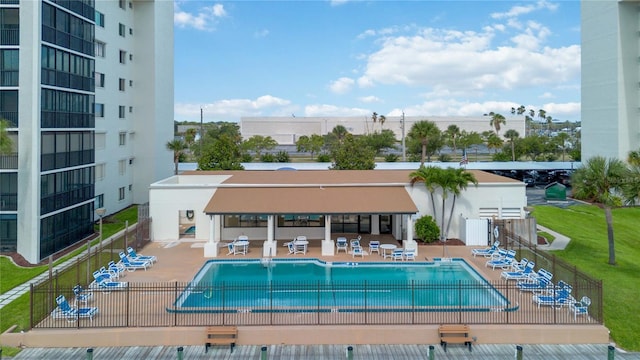 view of swimming pool featuring a patio area