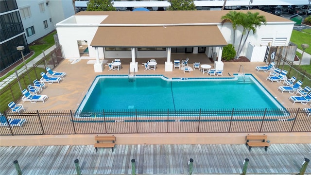 view of swimming pool with a patio