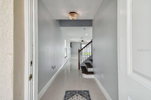 corridor with tile patterned floors