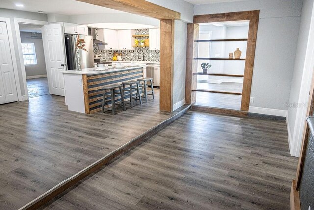 hallway featuring dark wood-type flooring