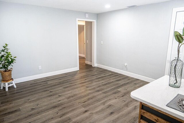 living room with dark wood-type flooring