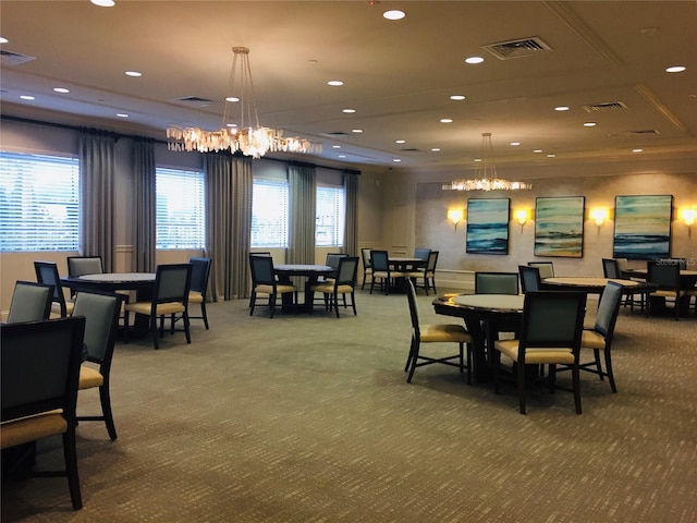 dining area with carpet, visible vents, and recessed lighting