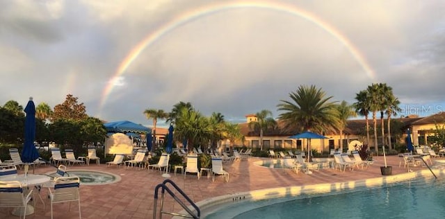 community pool featuring a patio area