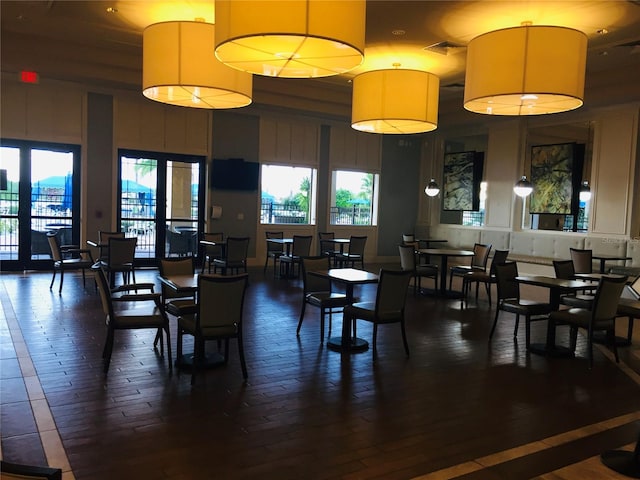 dining space featuring wood-type flooring