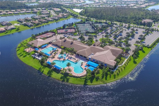 birds eye view of property featuring a water view