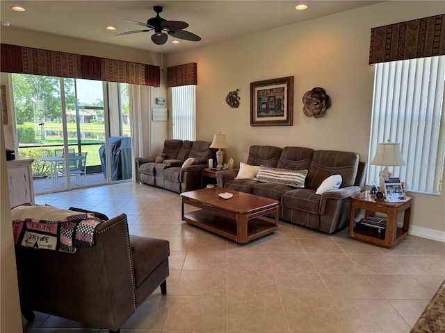 15953 Cobble Mill Dr, Wimauma, FL 33598 - living room featuring plenty of natural light, light tile patterned floors, ceiling fan, and recessed lighting