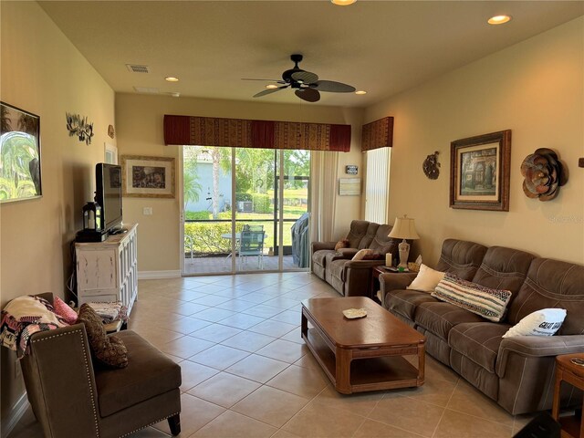 15953 Cobble Mill Dr, Wimauma, FL 33598 - living room with light tile patterned flooring, a ceiling fan, recessed lighting, and baseboards