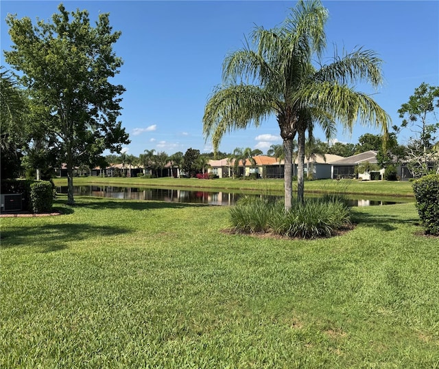 15953 Cobble Mill Dr, Wimauma, FL 33598 - view of grassy yard featuring a water view and a residential view
