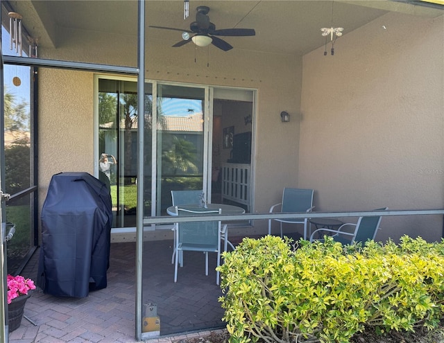 15953 Cobble Mill Dr, Wimauma, FL 33598 - view of patio featuring a ceiling fan and grilling area