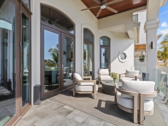 view of patio / terrace with ceiling fan and french doors