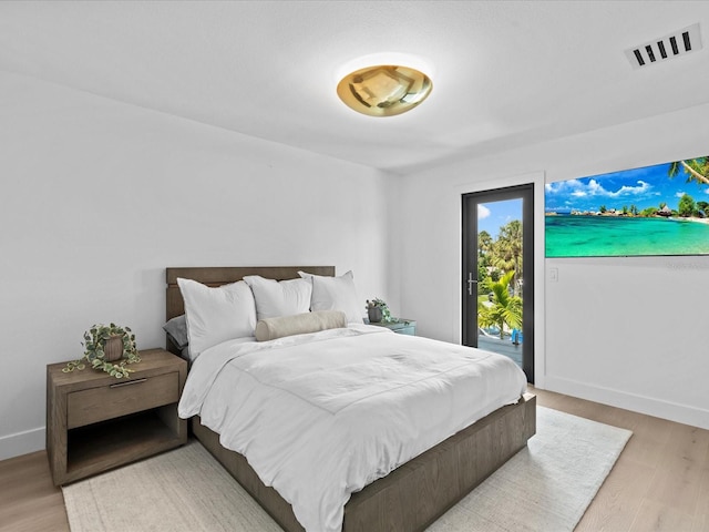 bedroom featuring light wood-type flooring