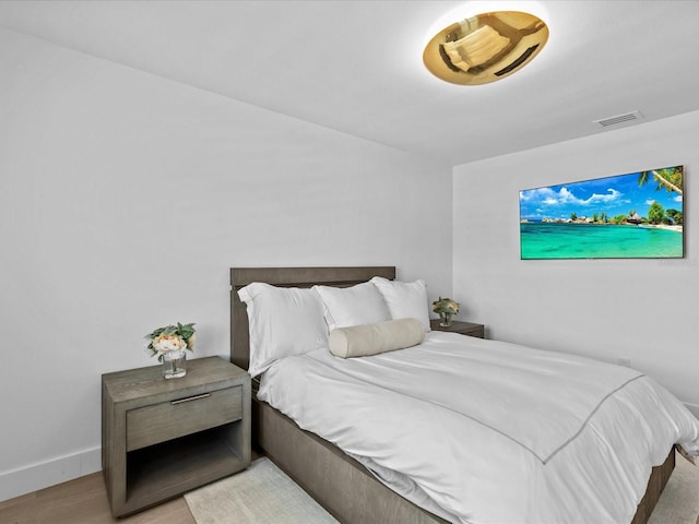 bedroom featuring light wood-type flooring