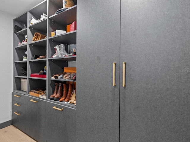 walk in closet featuring light wood-type flooring