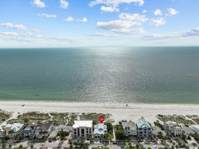 bird's eye view featuring a view of the beach and a water view