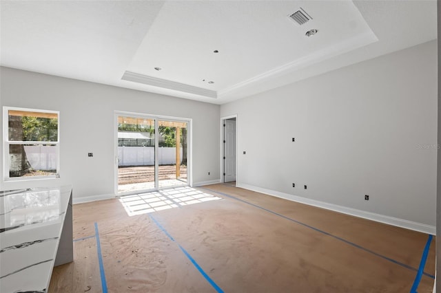 interior space featuring a tray ceiling