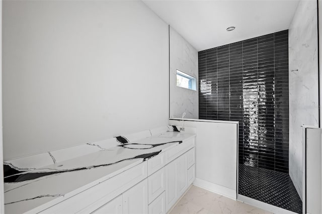 bathroom featuring vanity and walk in shower