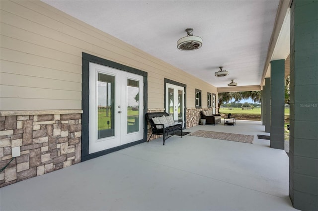 view of patio / terrace featuring french doors and outdoor lounge area