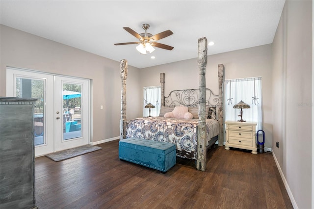 bedroom featuring multiple windows, dark hardwood / wood-style floors, access to outside, and french doors