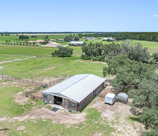 birds eye view of property featuring a rural view