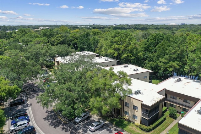 aerial view with a wooded view